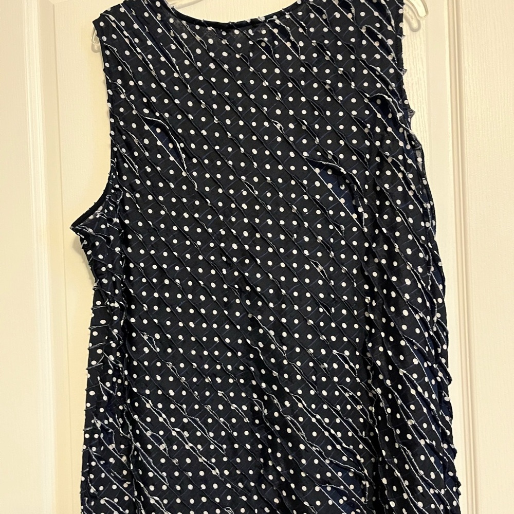 Cute sleeveless Navy Blue w/white dots Eyelash top.